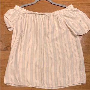 Off the shoulder shirt.